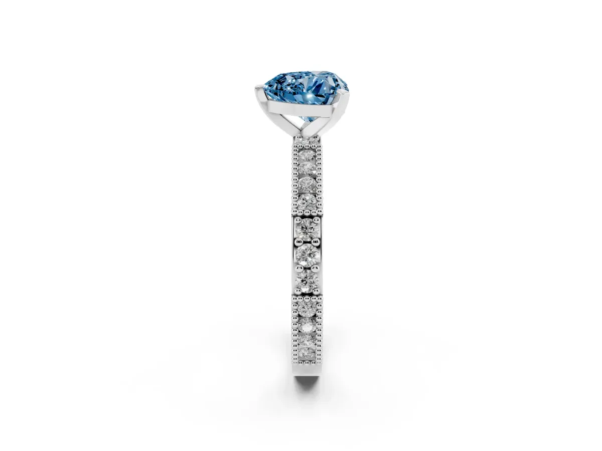 Fancy Blue Heart Cut Solitaire with Pavé Band and Four-Prong Setting Silver