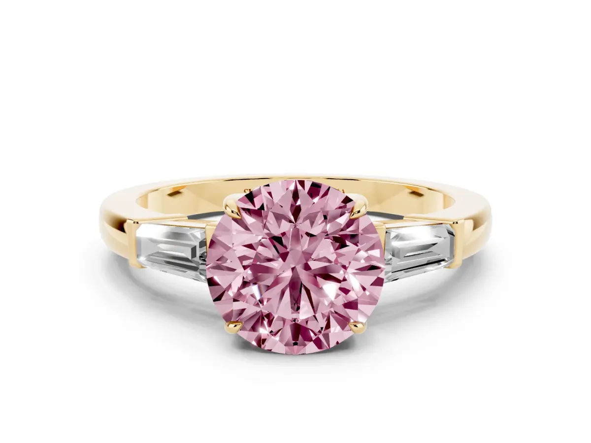 Fancy Pink Round Cut Diamond Three-Stone Ring with Tapered Baguette Side Stones and Prong Setting Yellow gold