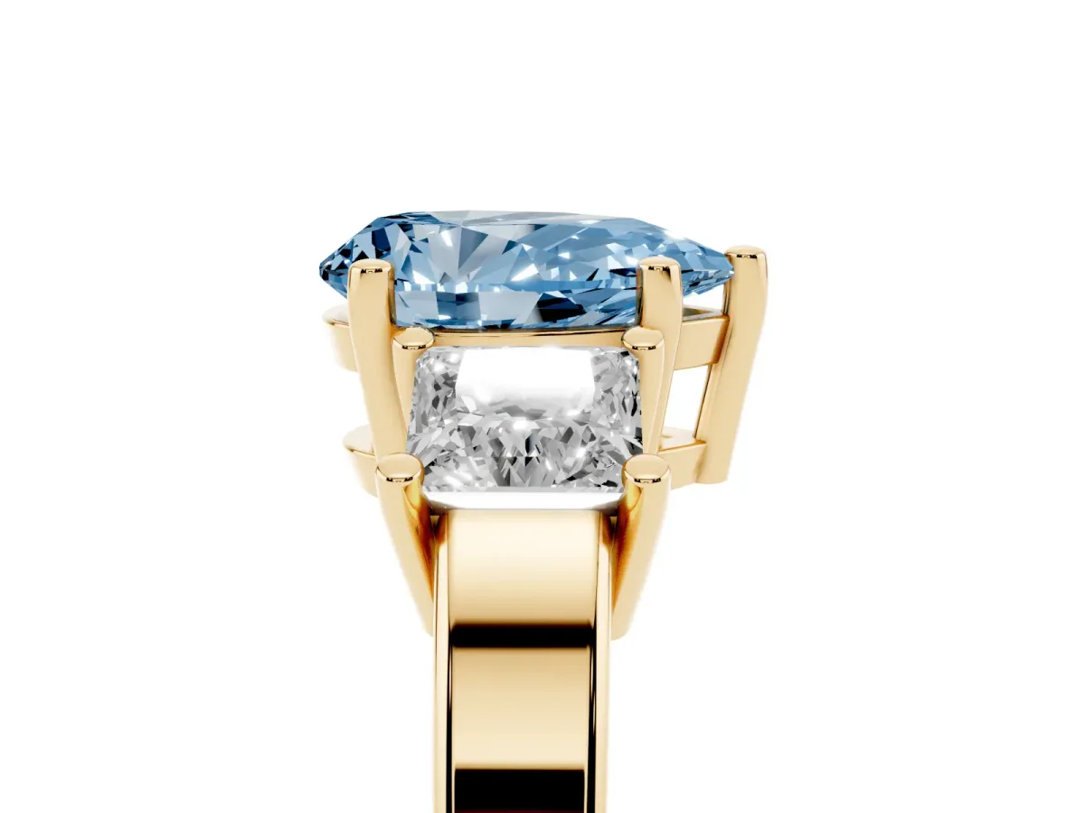 Fancy Blue Three-Stone Pear Cut Cut Solitaire Ring with Prong Setting Yellow gold