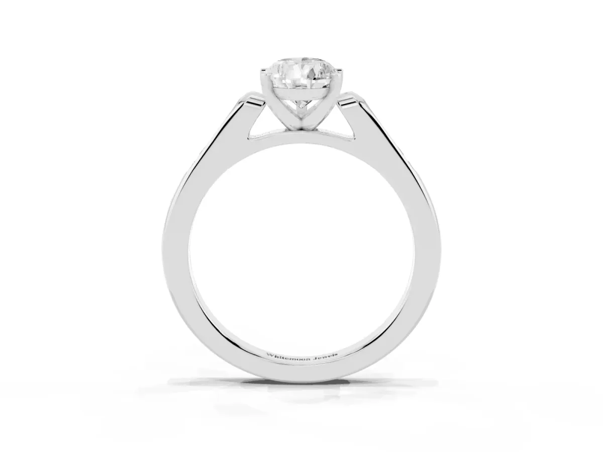 Pear Cut Diamond Solitaire Ring with Channel Set Round Band and Prong Setting Silver