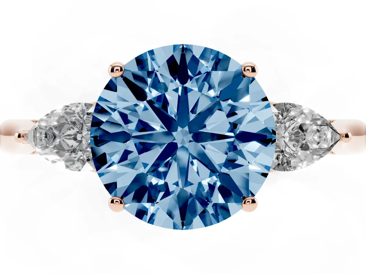Fancy Blue Round Cut Diamond Three-Stone Ring with Pear Side Stones and Prong Setting Rose gold