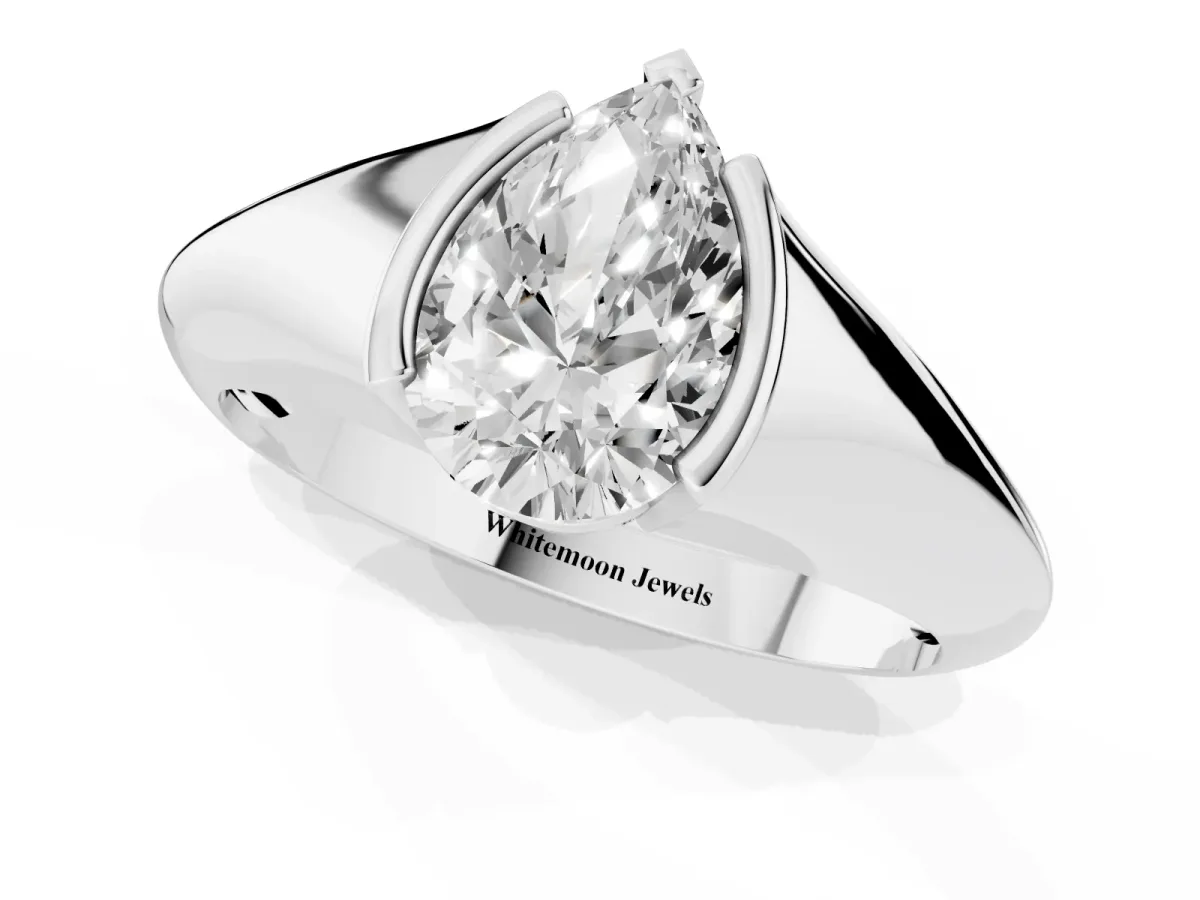 Pear Cut Solitaire Tension Set Diamond Ring White gold