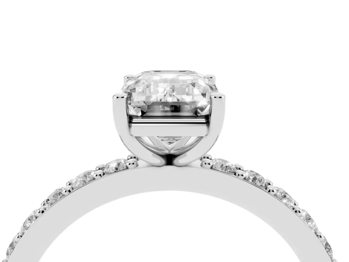 Emerald Cut Cut Diamond Solitaire with Pave Band and Four-Prong Setting Platinum