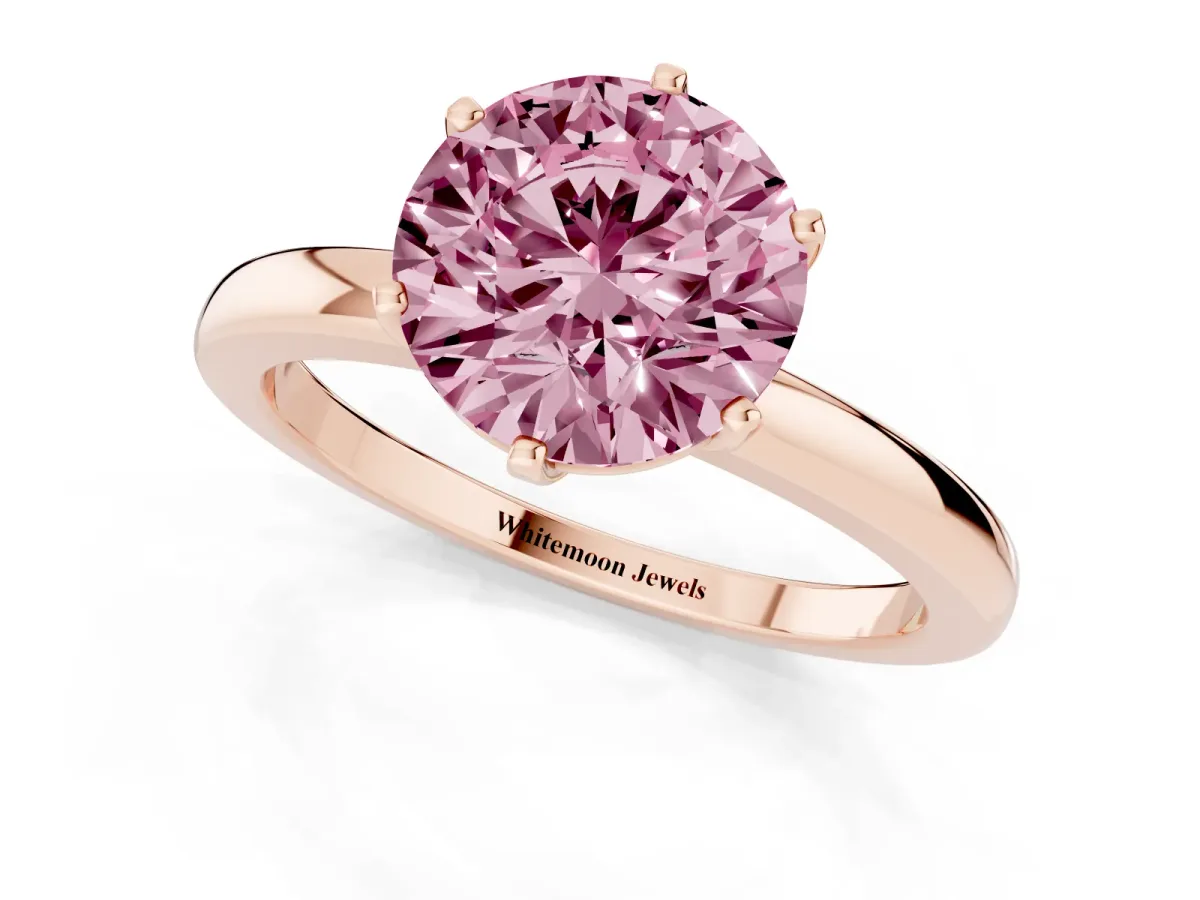 Fancy Pink Round Cut Solitaire Diamond Ring with Six-Prong Setting on a Classic Band Rose gold