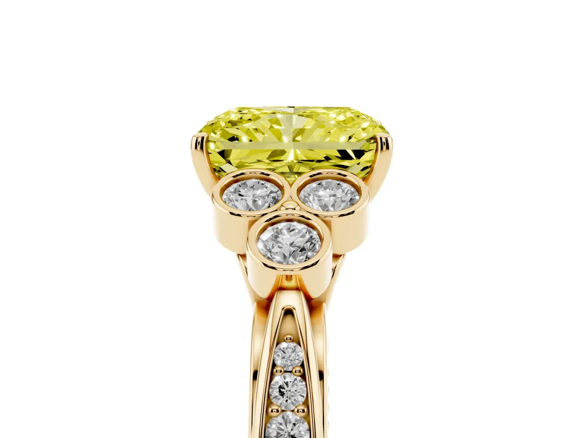 Fancy Yellow Radiant Cut Cut Diamond Engagement Ring with Bezel Set Round Side Stones and Prong Setting Yellow gold