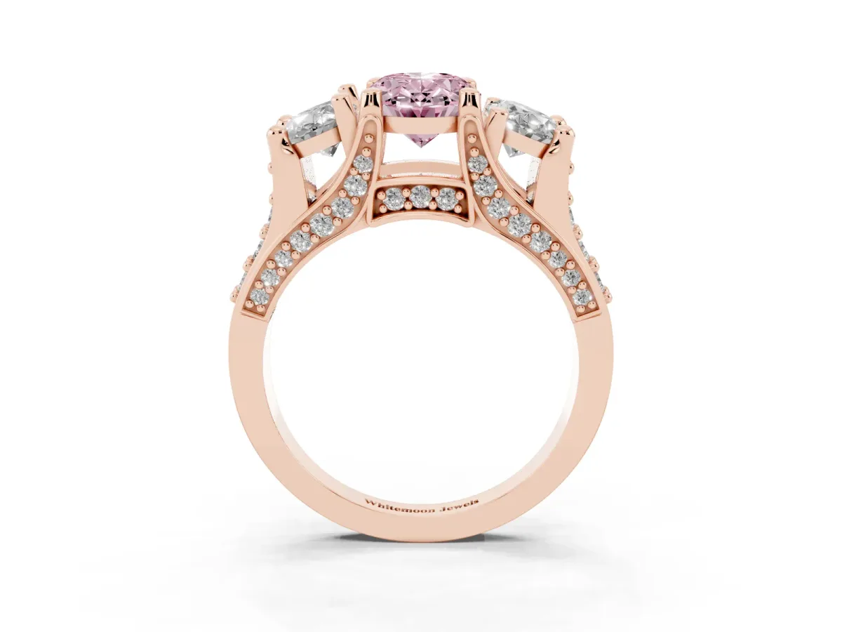 Fancy Pink Oval Cut Diamond Three-Stone Ring with Channel Set Band and Four-Prong Setting Rose gold