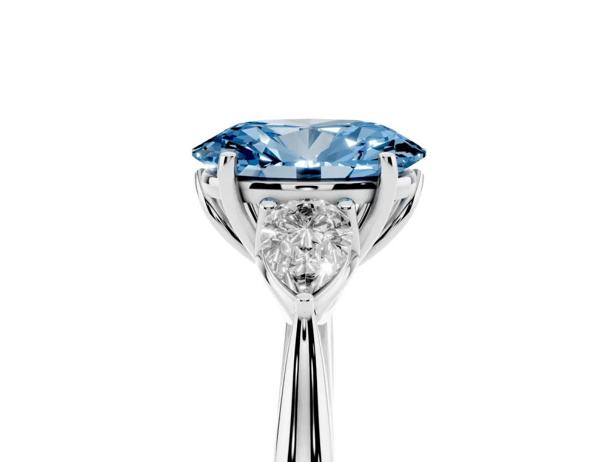Fancy Blue Three-Stone Oval Cut Diamond Ring with Pear Side Stones in Four-Prong Setting Silver