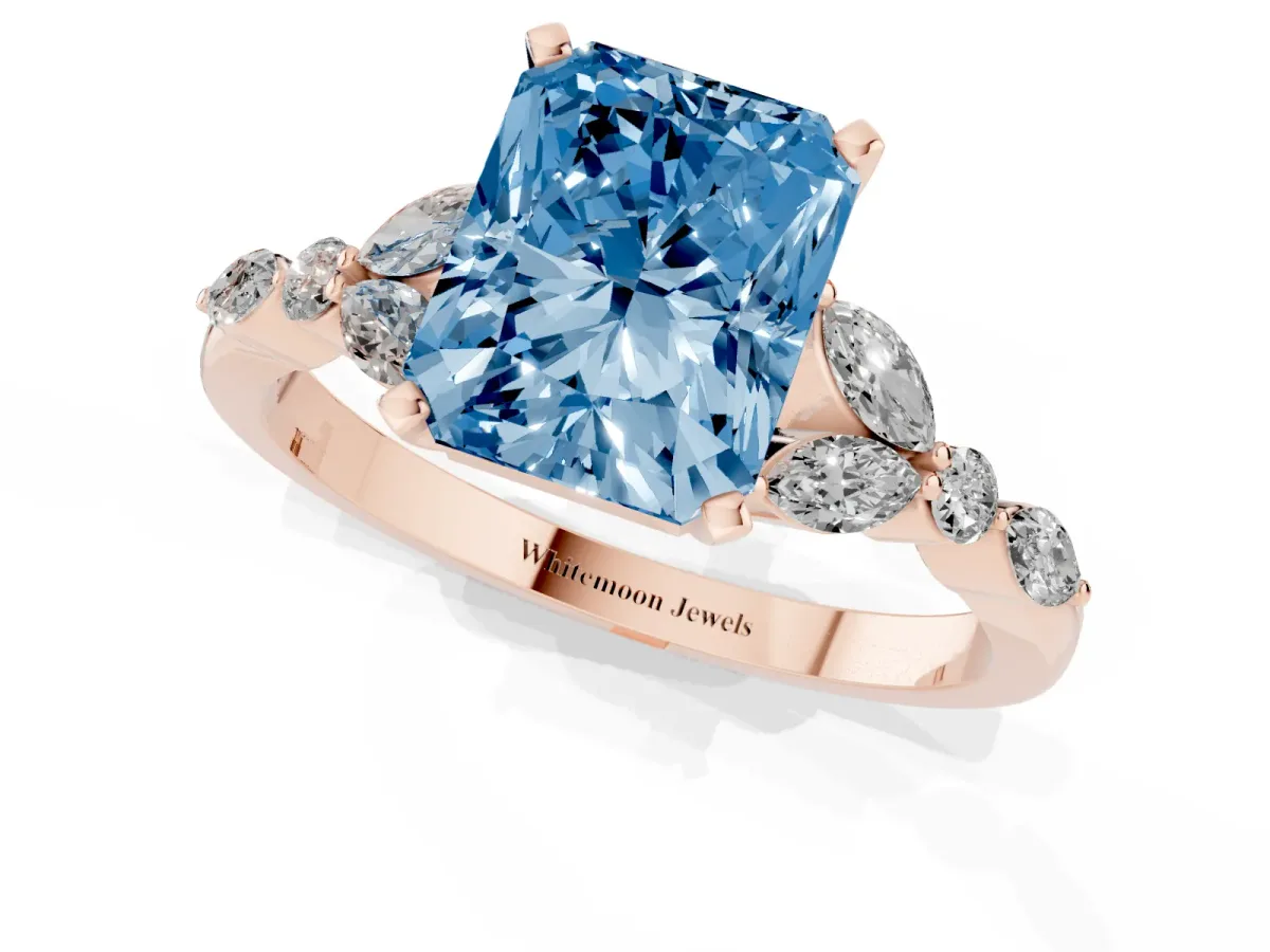 Fancy Blue Radiant Cut Diamond Solitaire Ring with Side Stones and Four-Prong Setting Rose gold