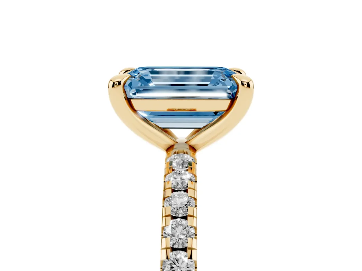 Fancy Blue Emerald Cut Diamond Brilliant Solitaire Ring with Pavé Band and Four-Prong Setting Yellow gold