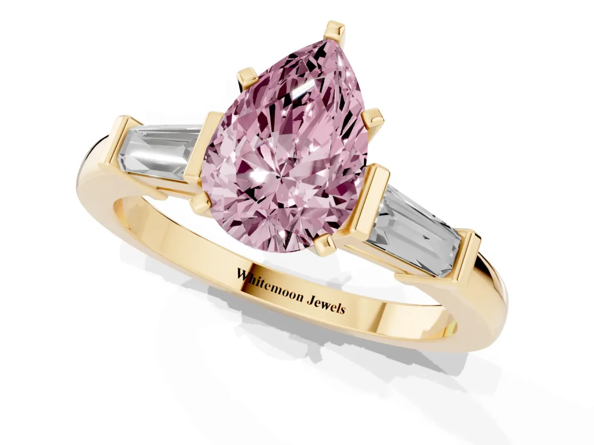 Fancy Pink Pear Cut Cut Diamond Solitaire Ring with Tapered Baguette Accents and Four-Prong Setting Yellow gold