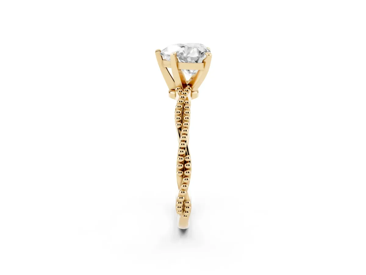 Heart Cut Solitaire Twisted Band with Bead Prong Setting Yellow gold