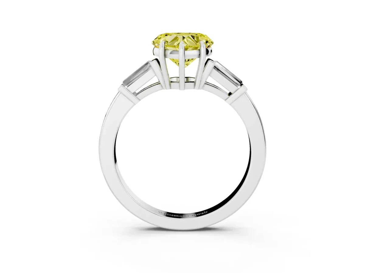 Fancy Yellow Heart Cut Diamond Three-Stone Ring with Tapered Baguette Side Stones and Prong Setting White gold