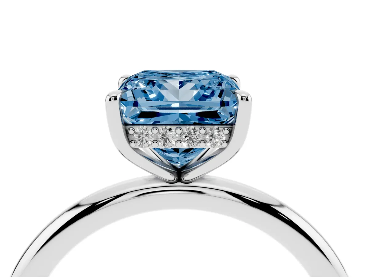 Fancy Blue Princess Cut Diamond Solitaire Ring with Thin Band and Four-Prong Setting Platinum