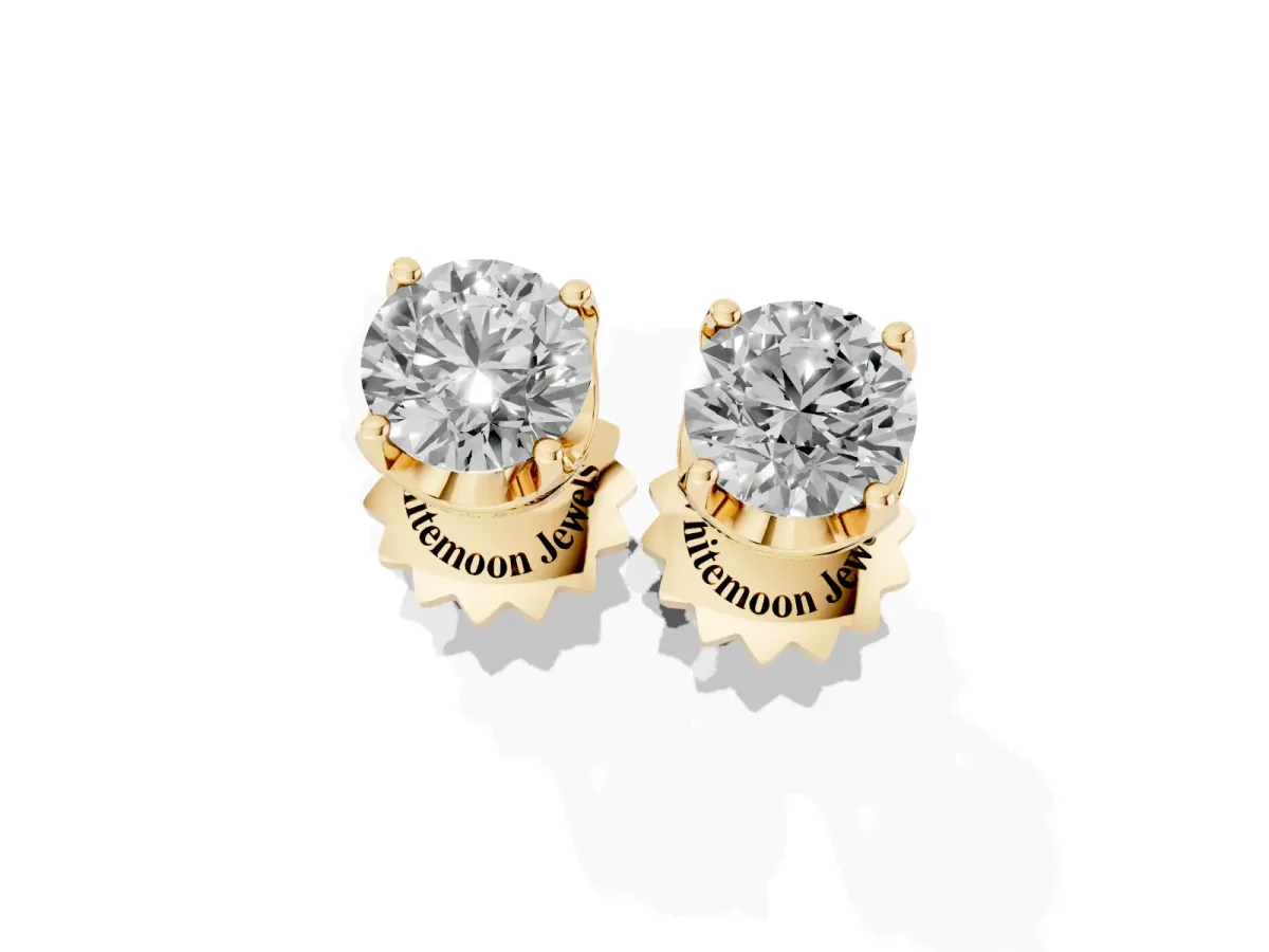 Round Solitaire Diamond Stud Earrings with Four-Prong Basket Setting Yellow gold