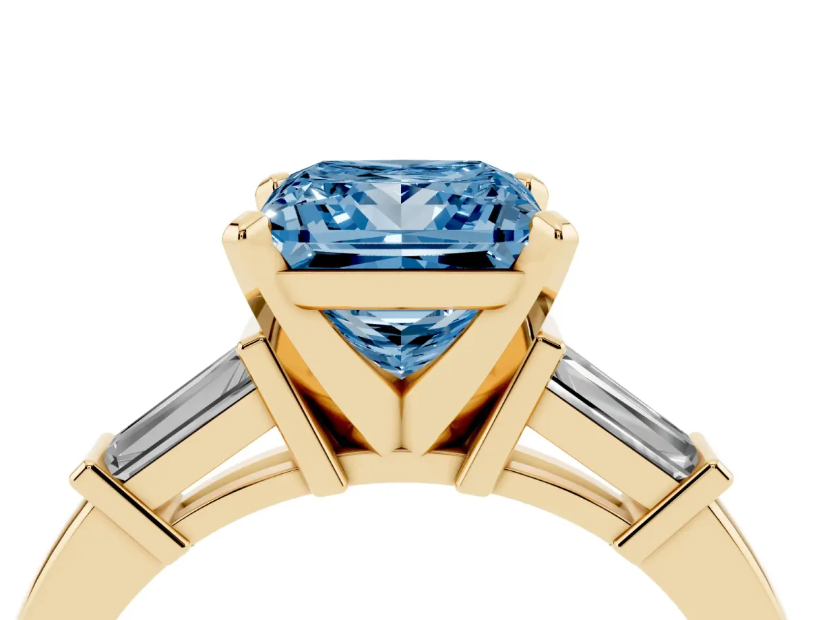 Fancy Blue Princess Cut Cut Diamond Solitaire Ring with Tapered Baguette Accents and Four-Prong Setting Yellow gold