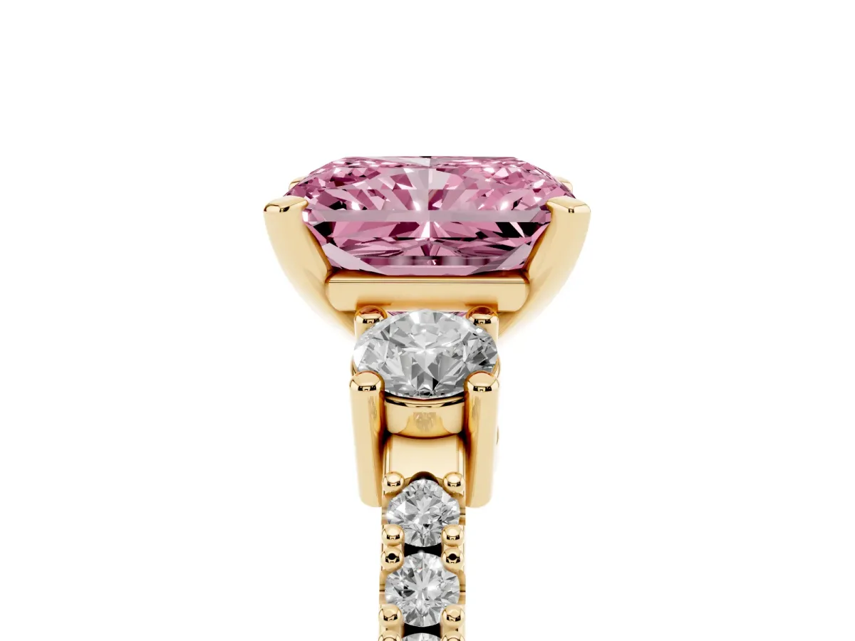 Fancy Pink Radiant Cut Three-Stone Diamond Pavé Band with Prong Setting Yellow gold