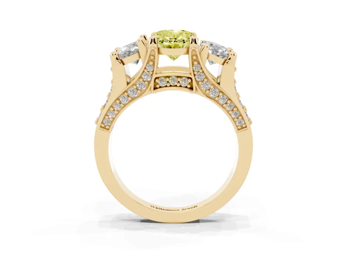 Fancy Yellow Oval Cut Diamond Three-Stone Ring with Channel Set Band and Four-Prong Setting Yellow gold