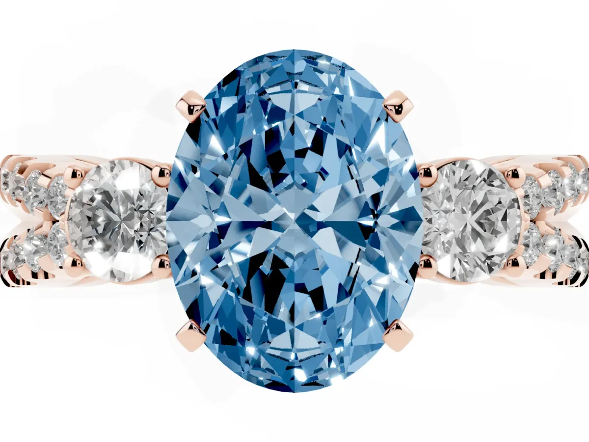 Fancy Blue Oval Cut Diamond Three-Stone Ring with Pavé Split Shank and Four-Prong Setting Rose gold