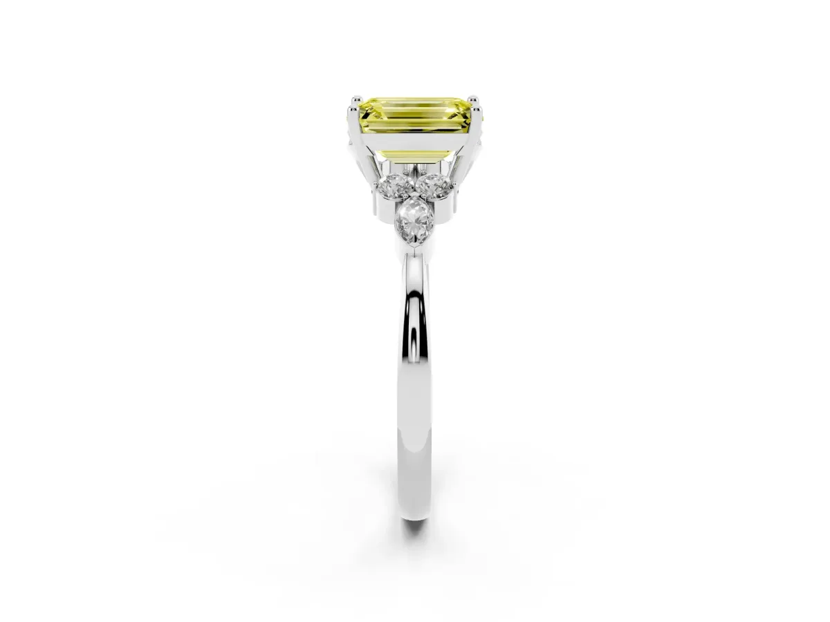Fancy Yellow Emerald Cut Brilliant Diamond Solitaire Ring with Pear Side Stones and Four-Prong Setting White gold