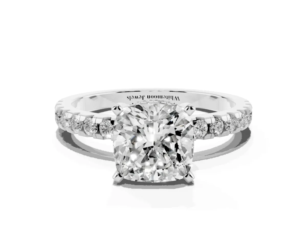 Cushion Cut Diamond Solitaire Ring with Round Pavé Band and Four-Prong Setting Silver