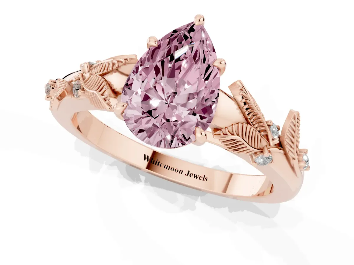 Fancy Pink Pear Cut Diamond Solitaire Ring with Leaf Motif Band and Four-Prong Setting Rose gold