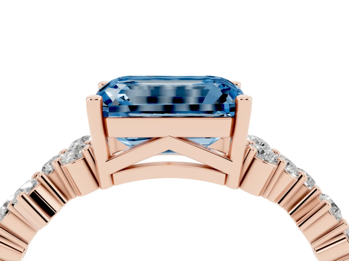 Fancy Blue Emerald Cut Diamond Scattered Round Accent Ring with Prong Setting Rose gold