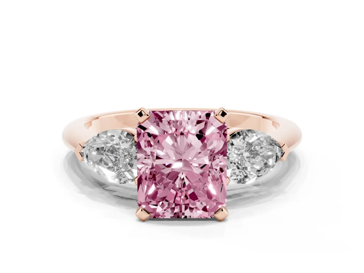 Fancy Pink Three-Stone Radiant Cut Diamond Ring with Pear Side Stones and Four-Prong Setting Rose gold