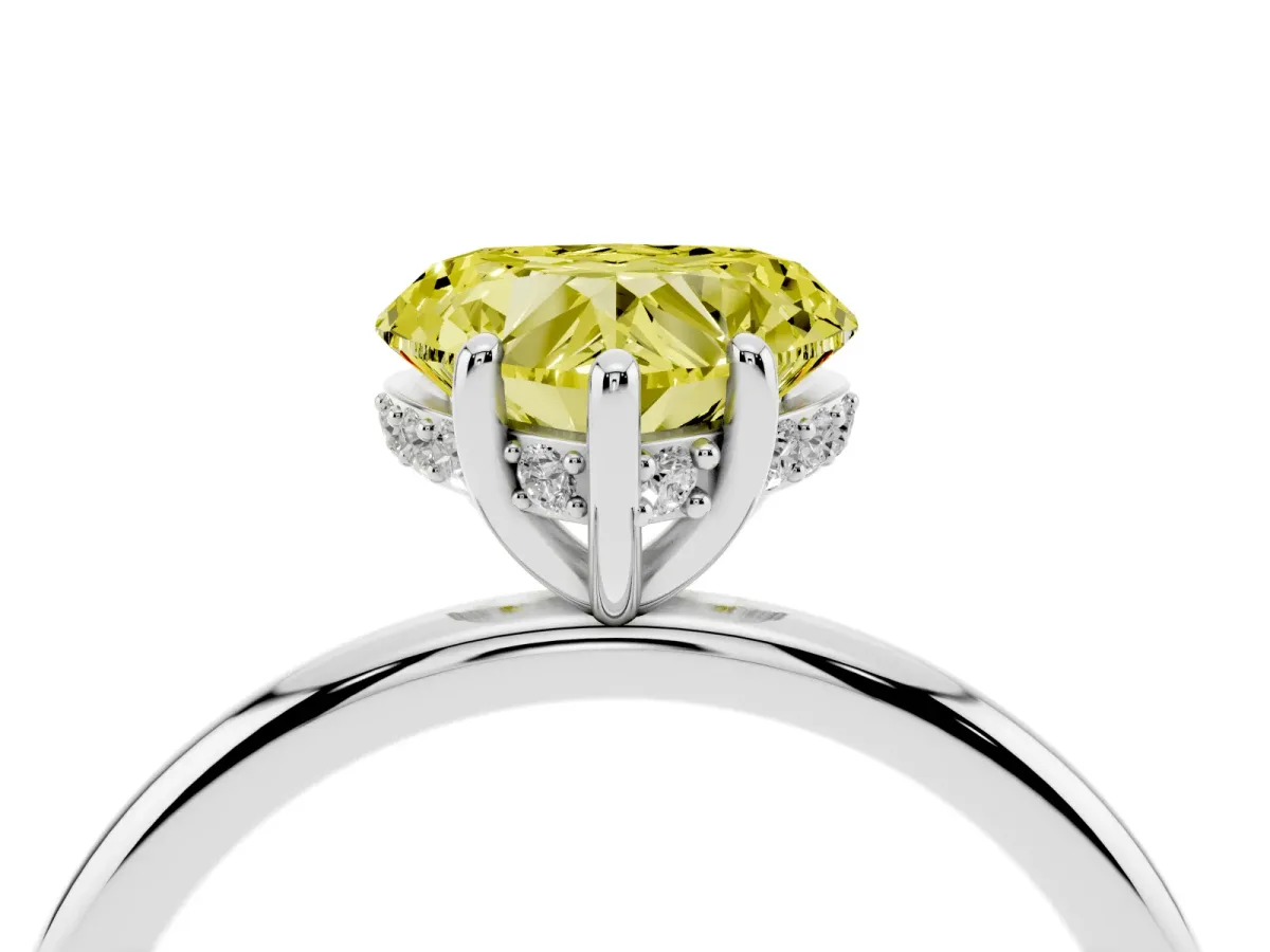 Fancy Yellow Heart Cut Solitaire Diamond Ring with a Classic Band and Four-Prong Setting Platinum