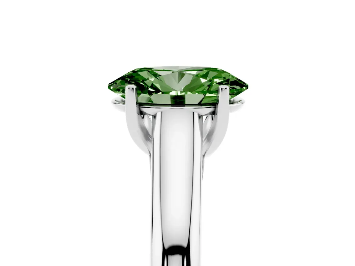 Fancy Green Oval Cut Solitaire Engagement Ring with Tapered Band and Four-Prong Setting Silver