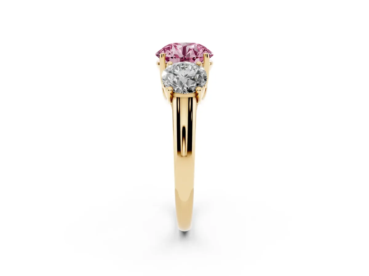 Fancy Pink Three-Stone Round Cut Diamond Engagement Ring with Prong Setting Yellow gold