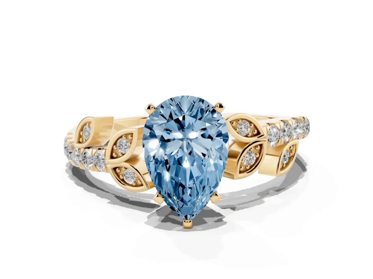 Fancy Blue Pear Cut Solitaire Leaf-Inspired Diamond Ring with Pavé Band and Four-Prong Setting Yellow gold