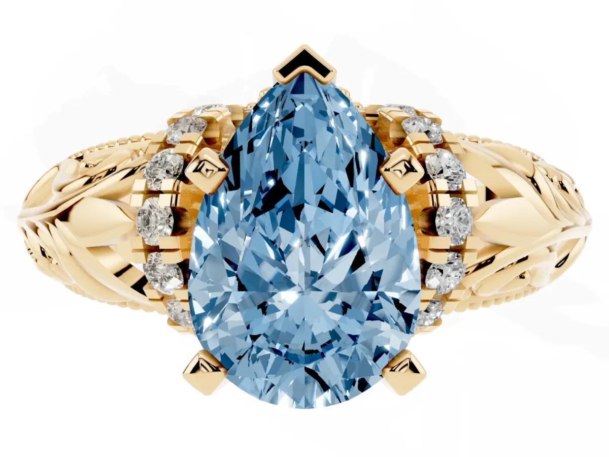 Fancy Blue Pear Cut Solitaire Filigree Engagement Ring with Halo and Prong Setting Yellow gold