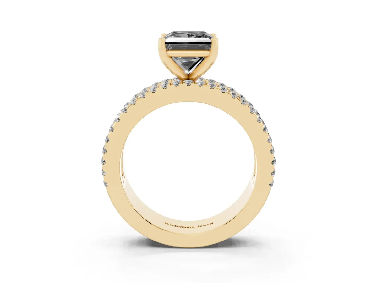 Fancy Black Princess Cut Diamond Solitaire Ring with Pavé and Channel Set Band Yellow gold