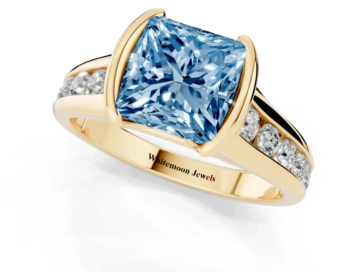 Fancy Blue Princess Cut Solitaire Bezel-Set Diamond Ring with Channel-Set Band Yellow gold