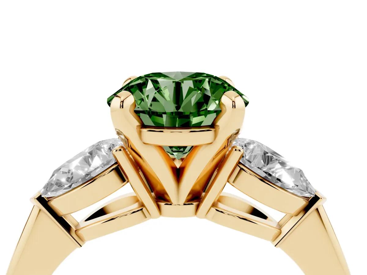 Fancy Green Three-Stone Round Cut Diamond Ring with Pear Side Stones and Four-Prong Setting Yellow gold