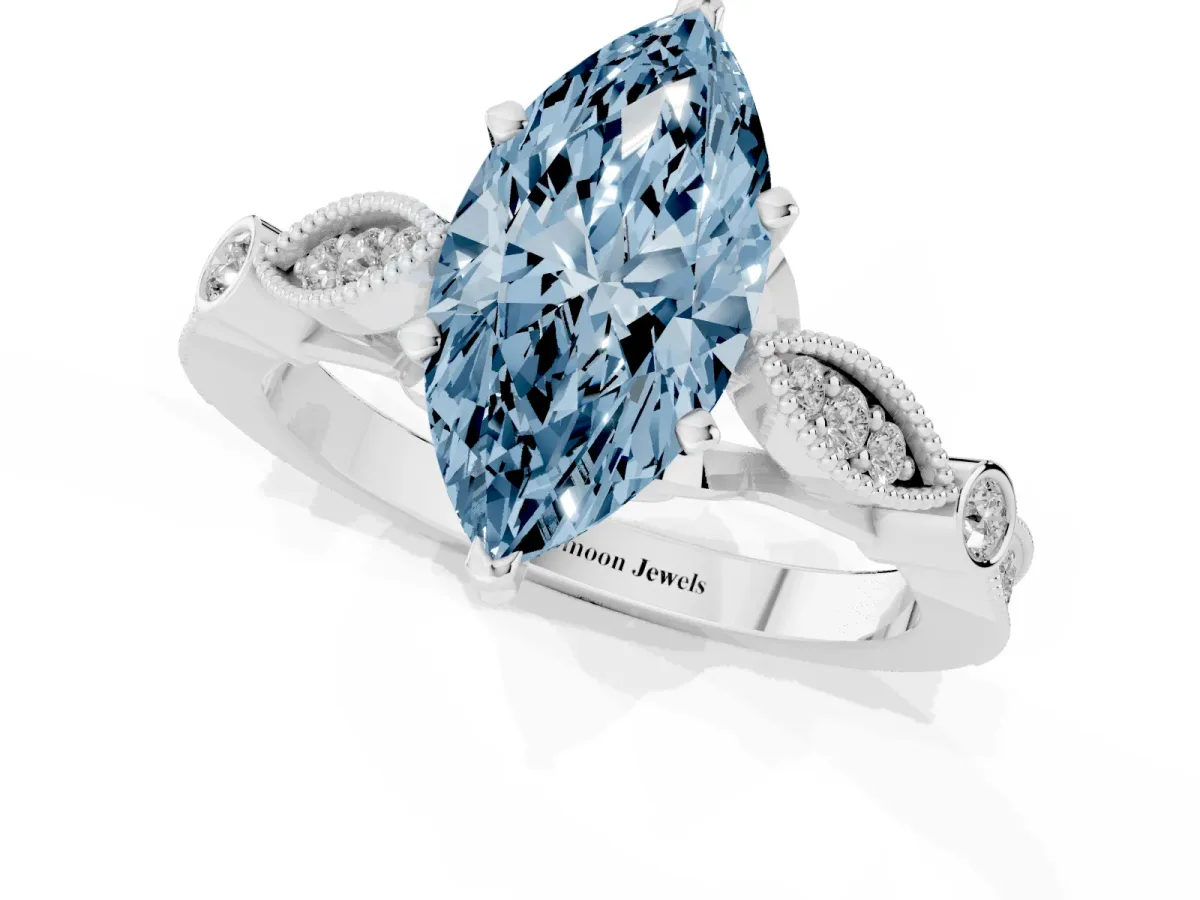 Fancy Blue Marquise Cut Cut Diamond with Milgrain Marquise and Bezel Accents on a Solitaire Band with Prong Setting Silver