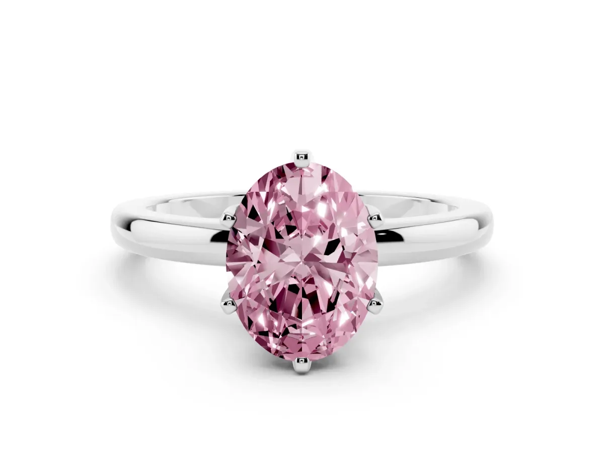 Fancy Pink Oval Cut Solitaire Diamond Ring with Six-Prong Setting on a Classic Band Silver