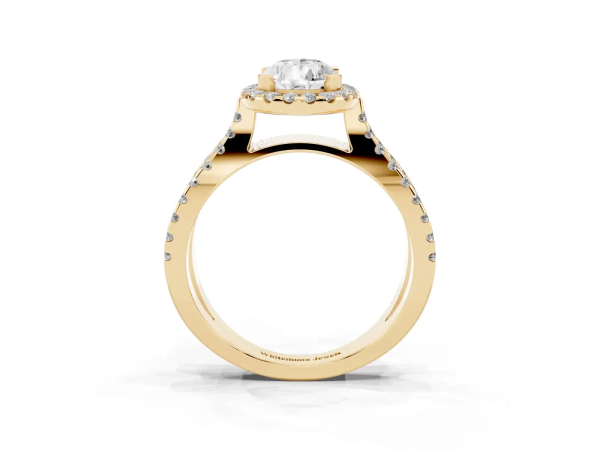 Pear Cut Diamond Halo Ring with Split Shank Pavé Band and Prong Setting Yellow gold