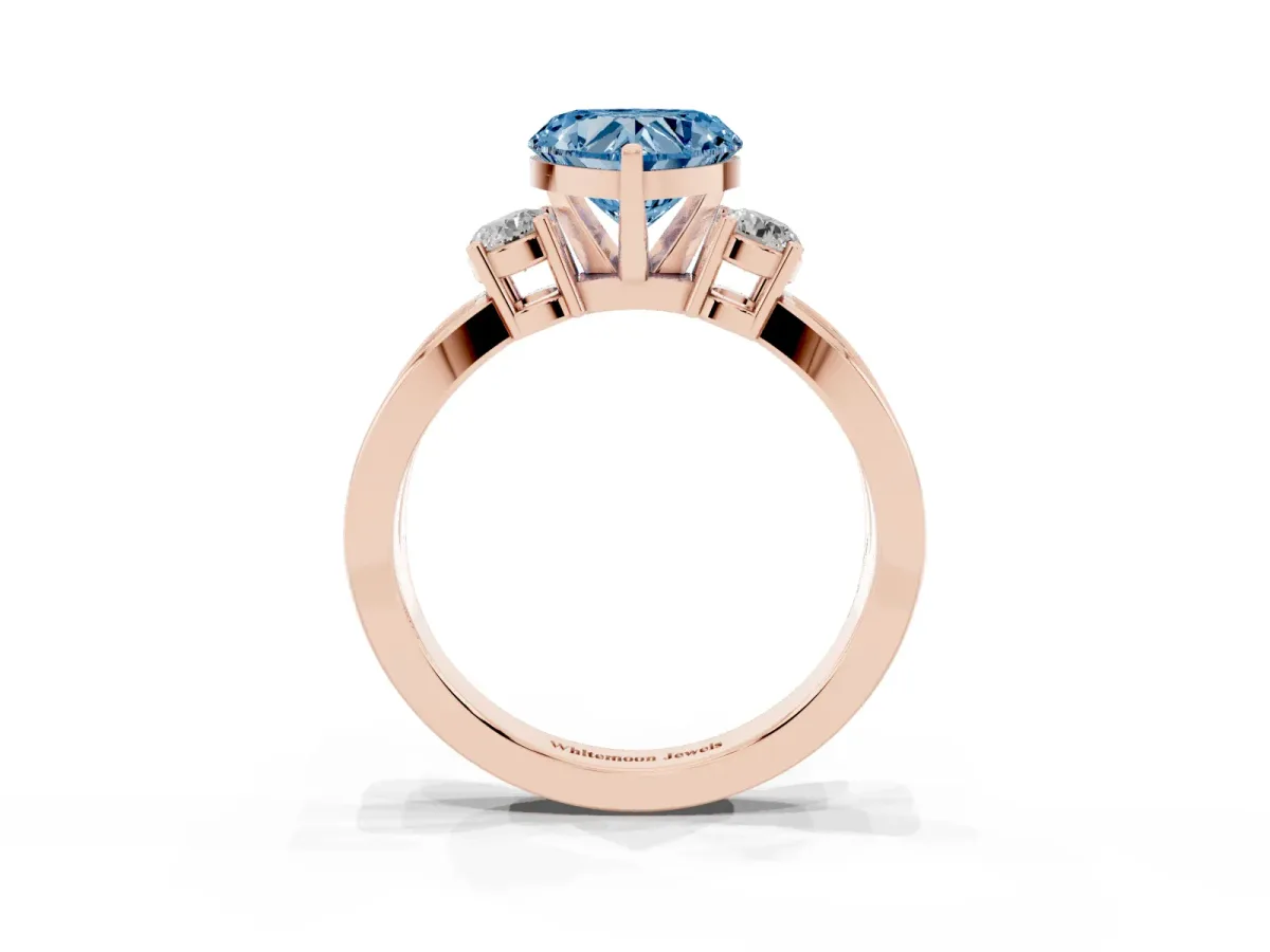 Fancy Blue Three-Stone Heart Cut Cut Diamond Twist Band with Prong Setting Rose gold