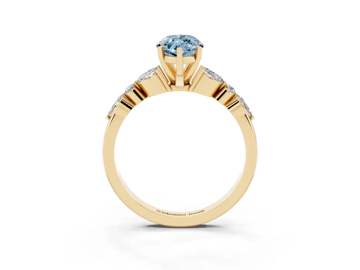 Fancy Blue Marquise Cut Diamond Solitaire Ring with Side Stones and Four-Prong Setting Yellow gold