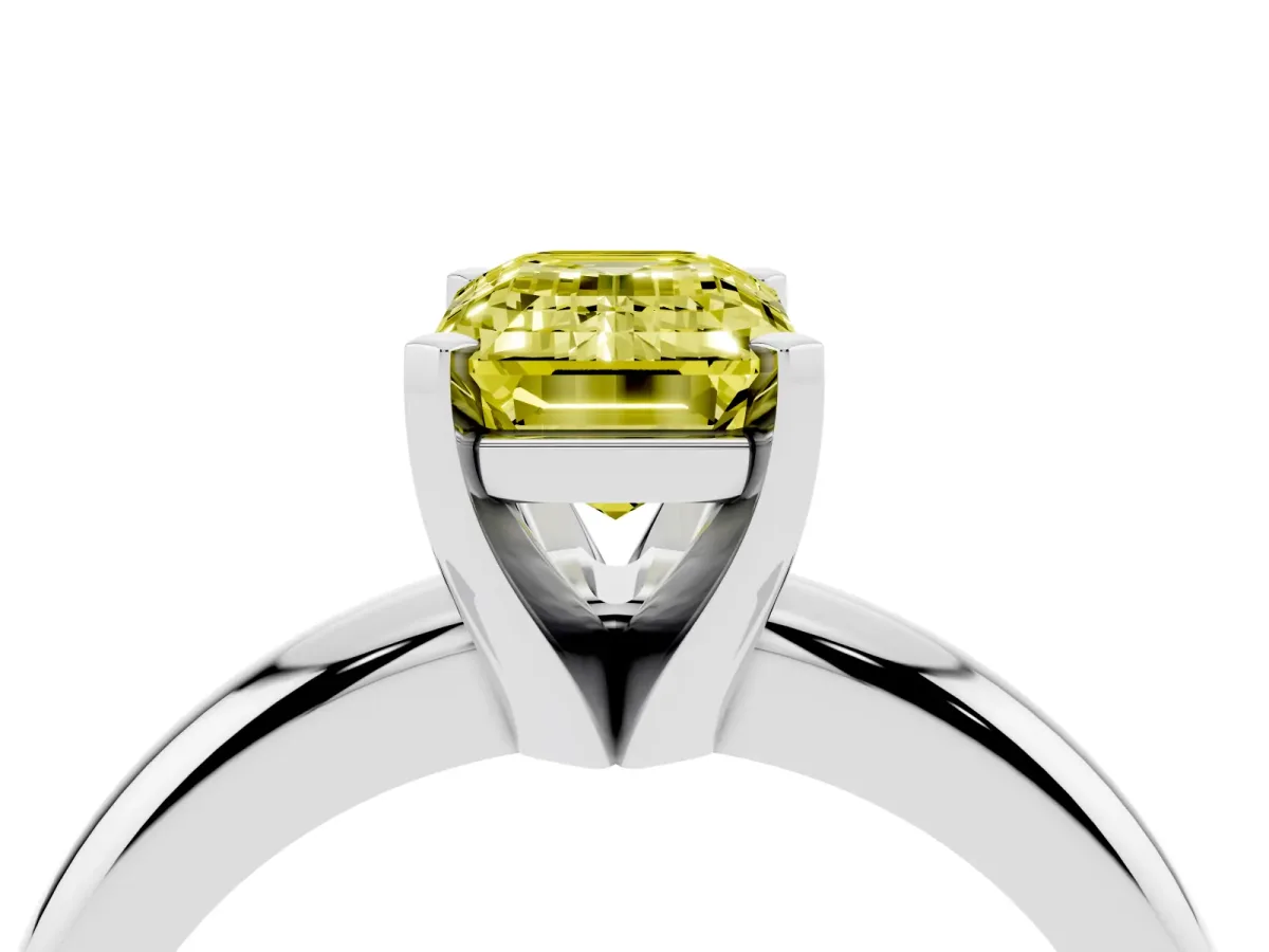 Fancy Yellow Emerald Cut Diamond Solitaire Engagement Ring with Round Band and Four-Prong Setting White gold