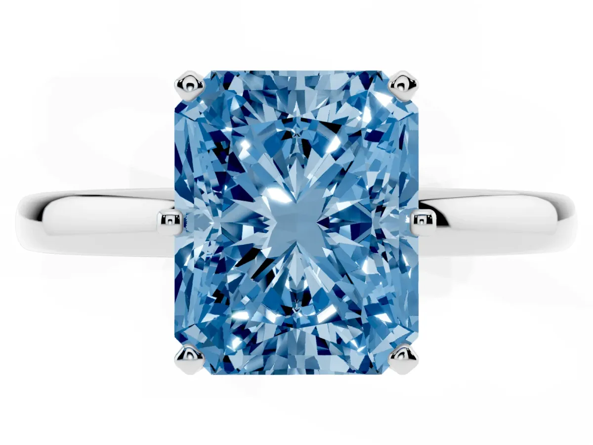 Fancy Blue Radiant Cut Solitaire Diamond Ring with Six-Prong Setting on a Classic Band Silver
