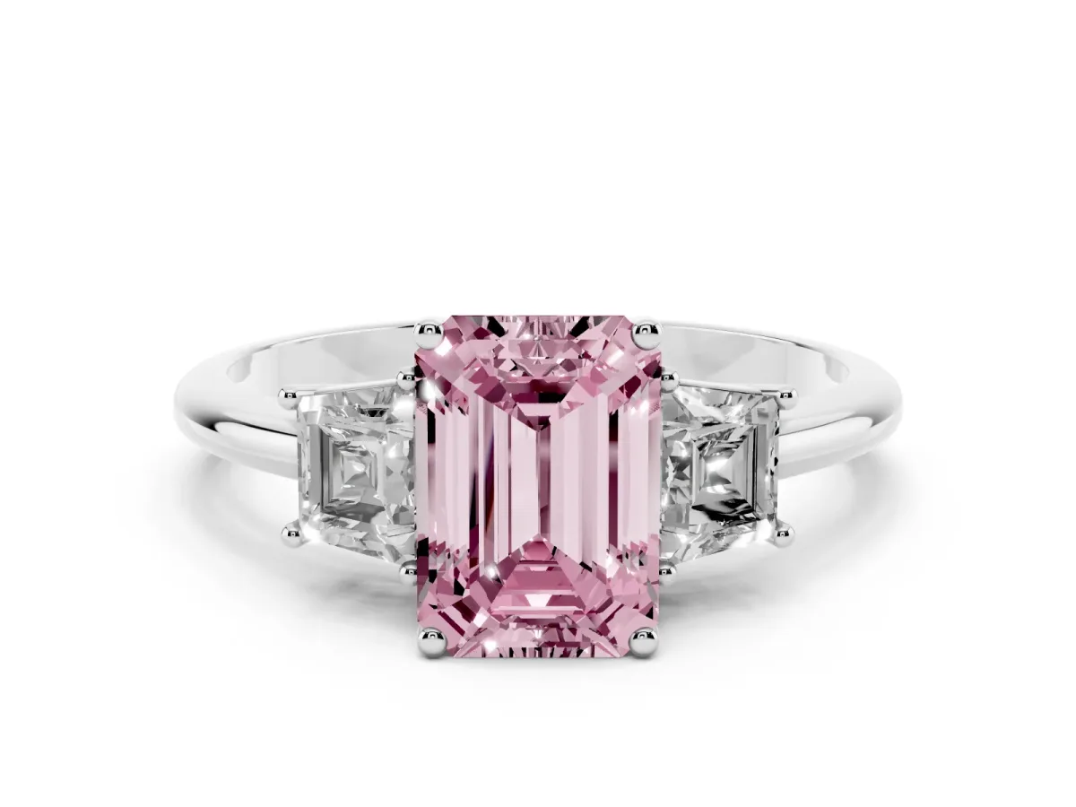 Fancy Pink Emerald Cut Diamond Three-Stone Ring with Trapezoid Side Stones and Prong Setting Platinum