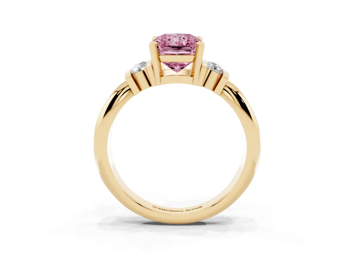 Fancy Pink Radiant Cut Cut Three-Stone Channel Set Ring with Bar Prongs Yellow gold