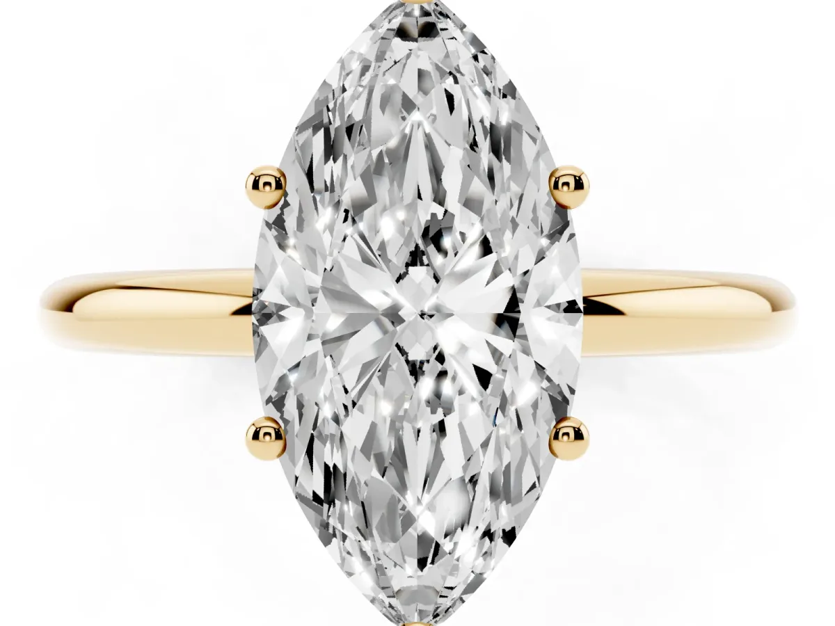 Marquise Cut Cut Solitaire Engagement Ring with Four-Prong Setting and Classic Band Yellow gold
