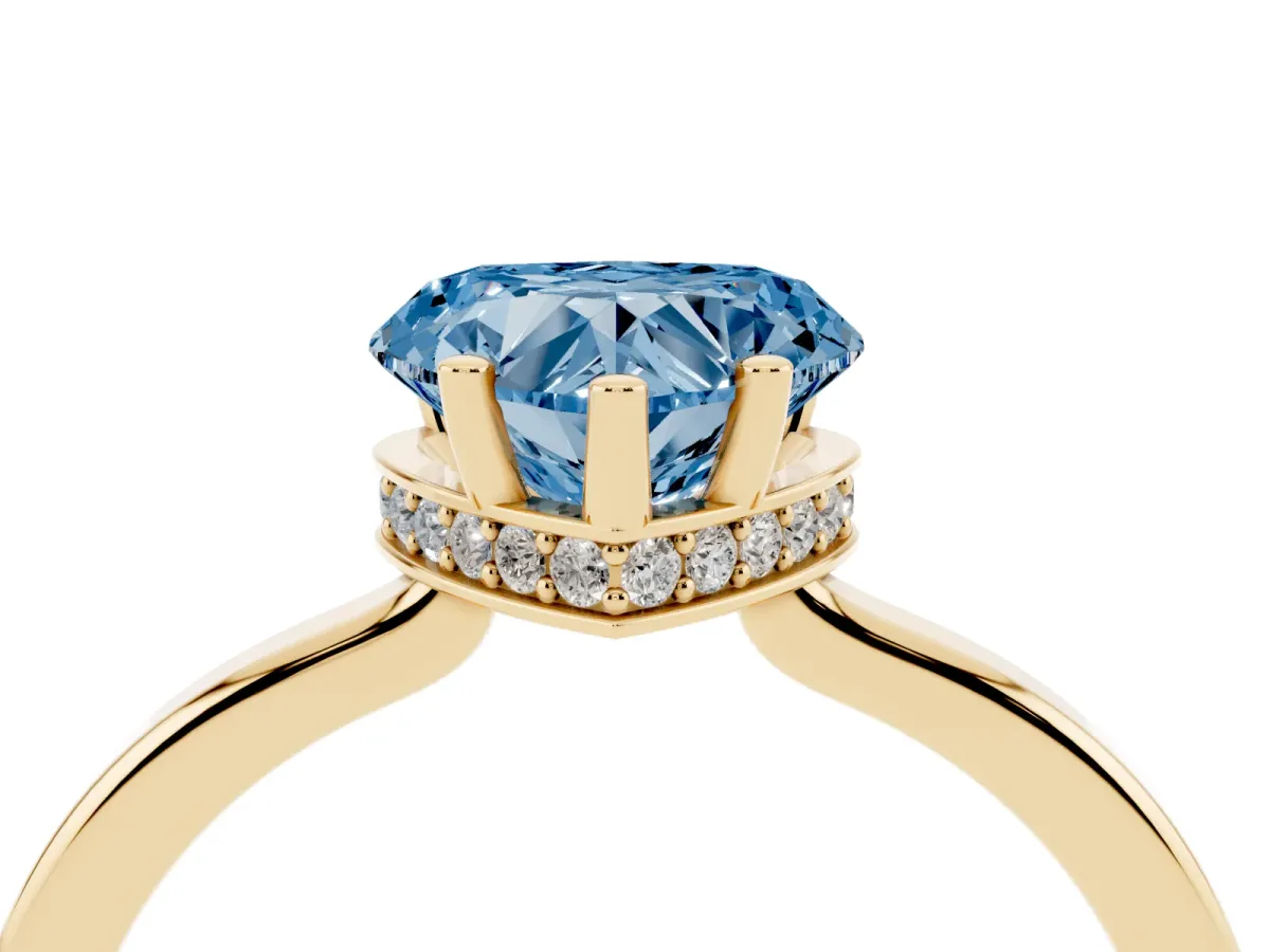 Fancy Blue Heart Cut Cut Solitaire Engagement Ring with Four-Prong Setting on a Classic Band Yellow gold