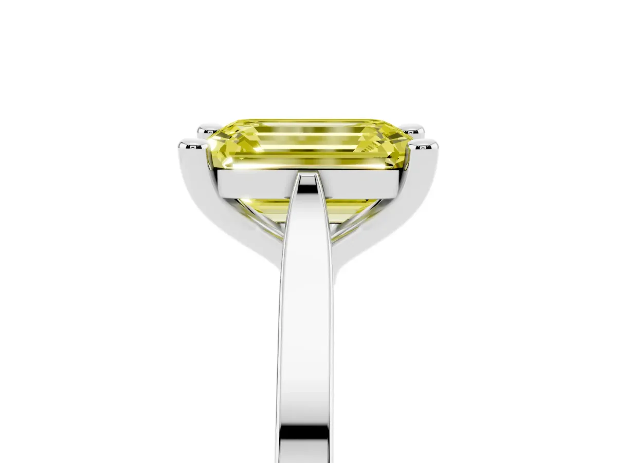 Fancy Yellow Emerald Cut Solitaire Diamond Ring with Four-Prong Setting and Tapered Band Silver
