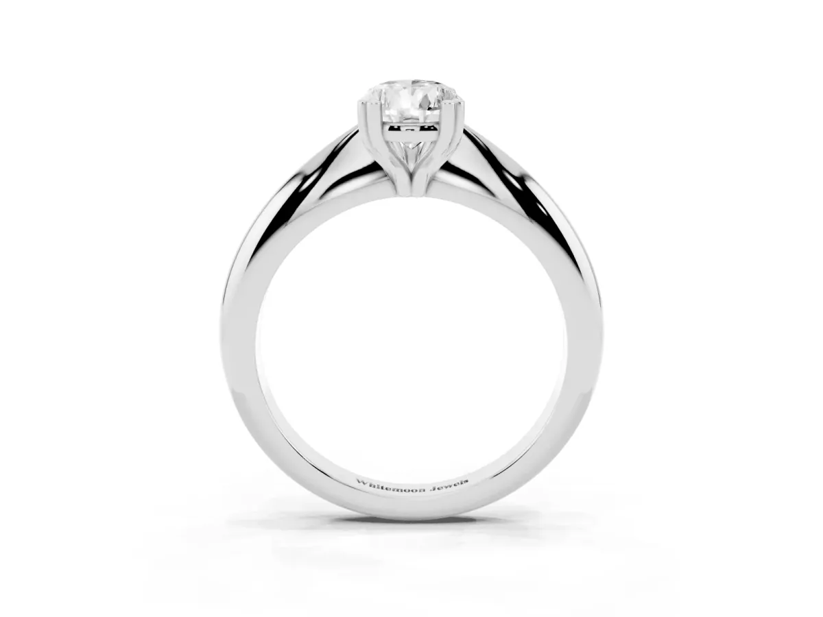 Pear Cut Cut Solitaire Engagement Ring with Tapered Band and Four-Prong Setting Platinum