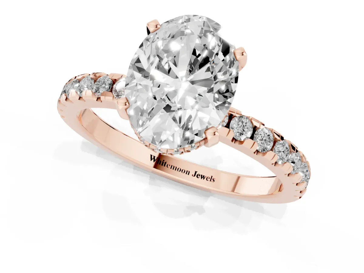 Oval Cut Diamond Solitaire Ring with Round Pavé Band and Four-Prong Setting Rose gold