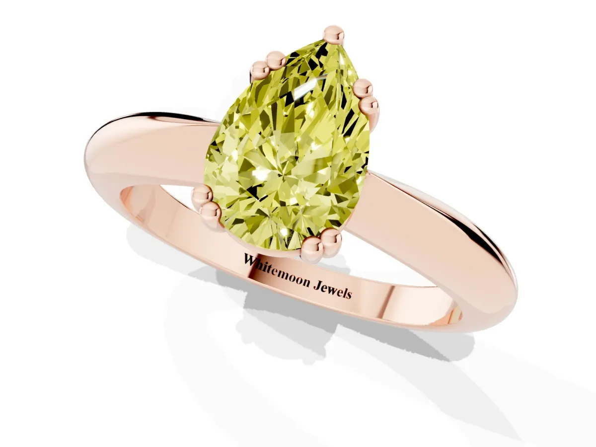 Fancy Yellow Pear Cut Cut Solitaire Engagement Ring with Tapered Band and Four-Prong Setting Rose gold